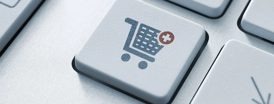 e-commerce shopping cart on a keyboard key